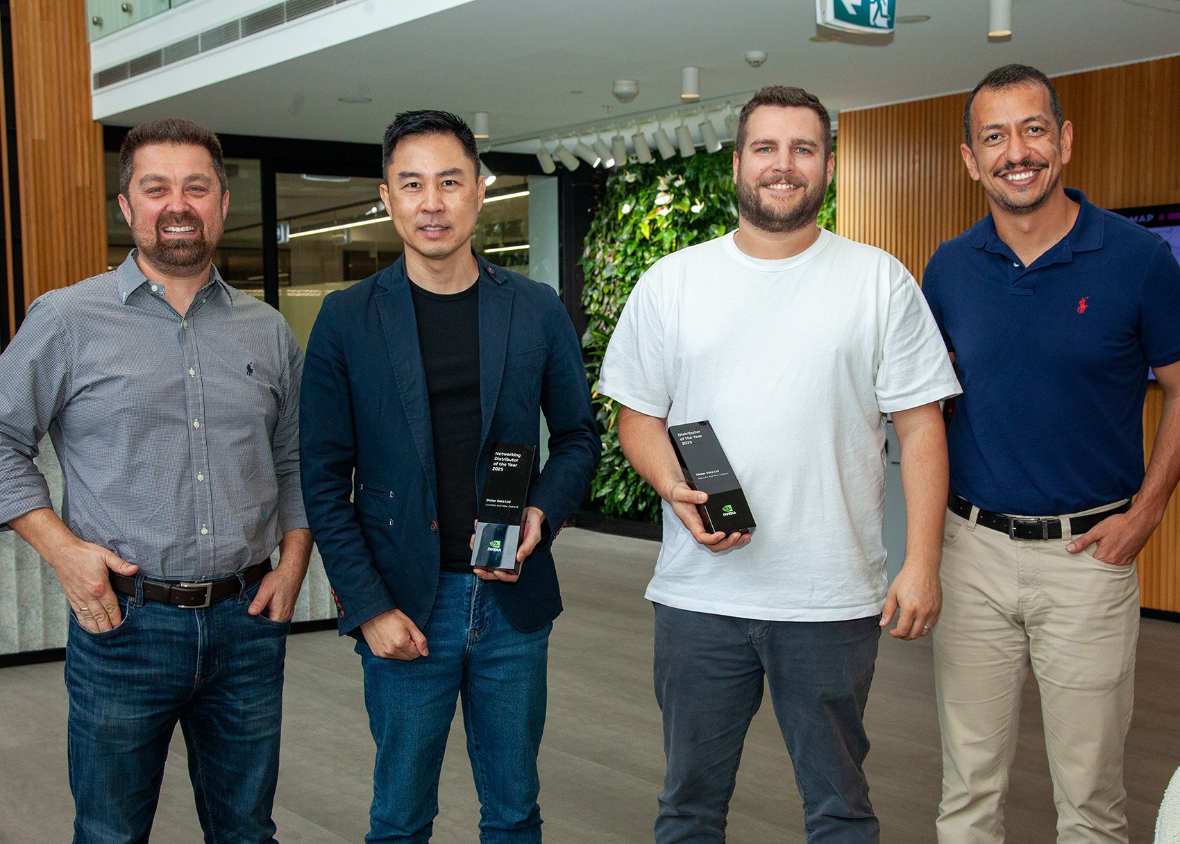 Dicker Data team holding award