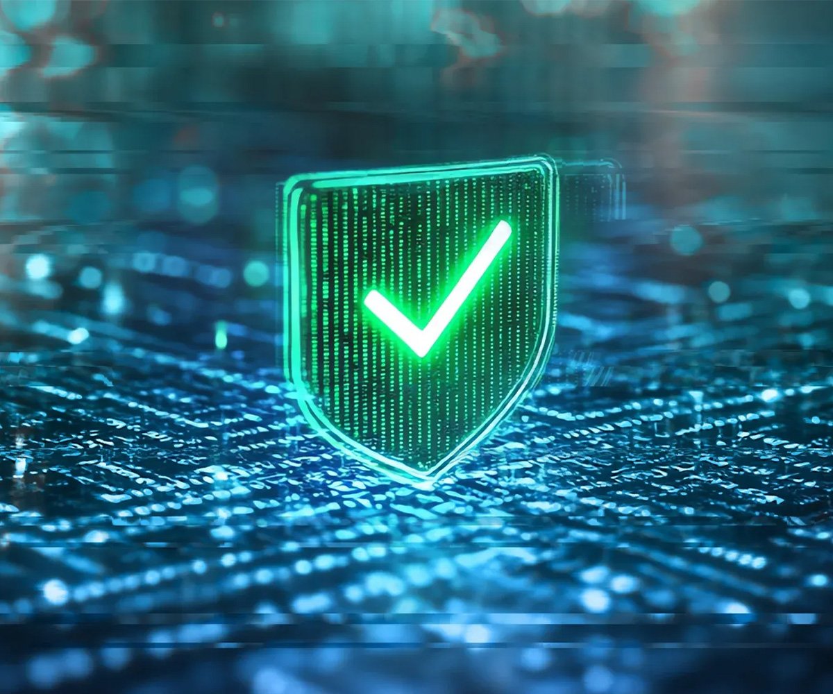 Green shield with a checkmark over a digital circuit background