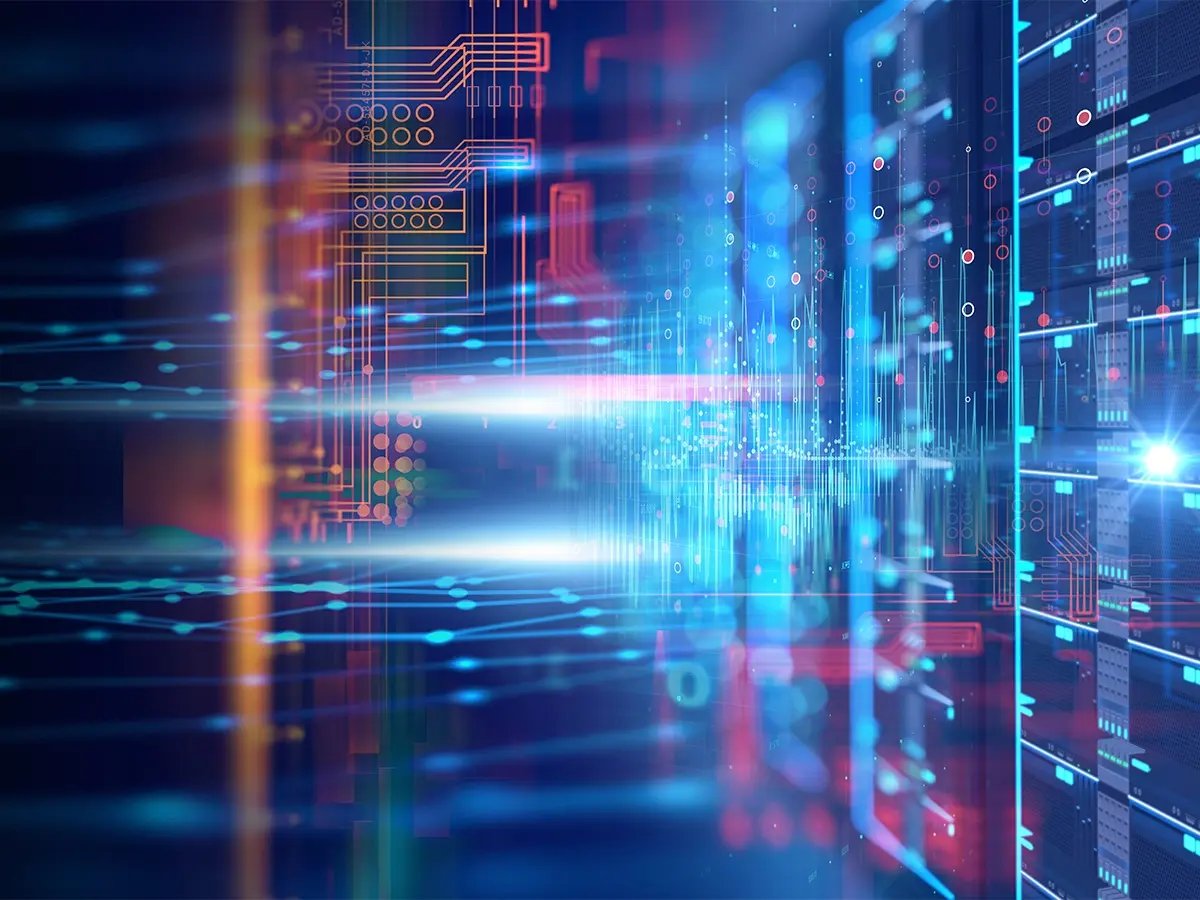 Abstract view of a data center with glowing blue and red server racks and digital circuit patterns, symbolizing hyperconverged infrastructure.