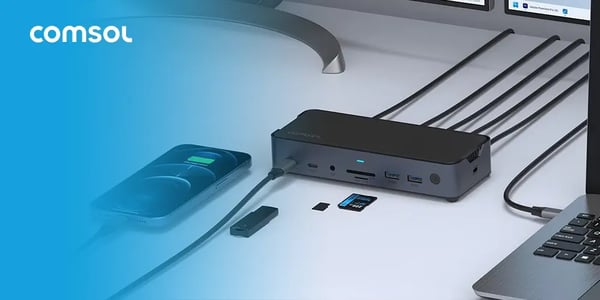 Docking station connected to multiple devices including a laptop, smartphone, and memory cards.