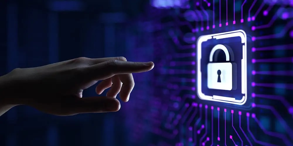 Hand reaching toward a glowing digital padlock icon on a circuit-style interface, symbolizing cybersecurity or data protection.