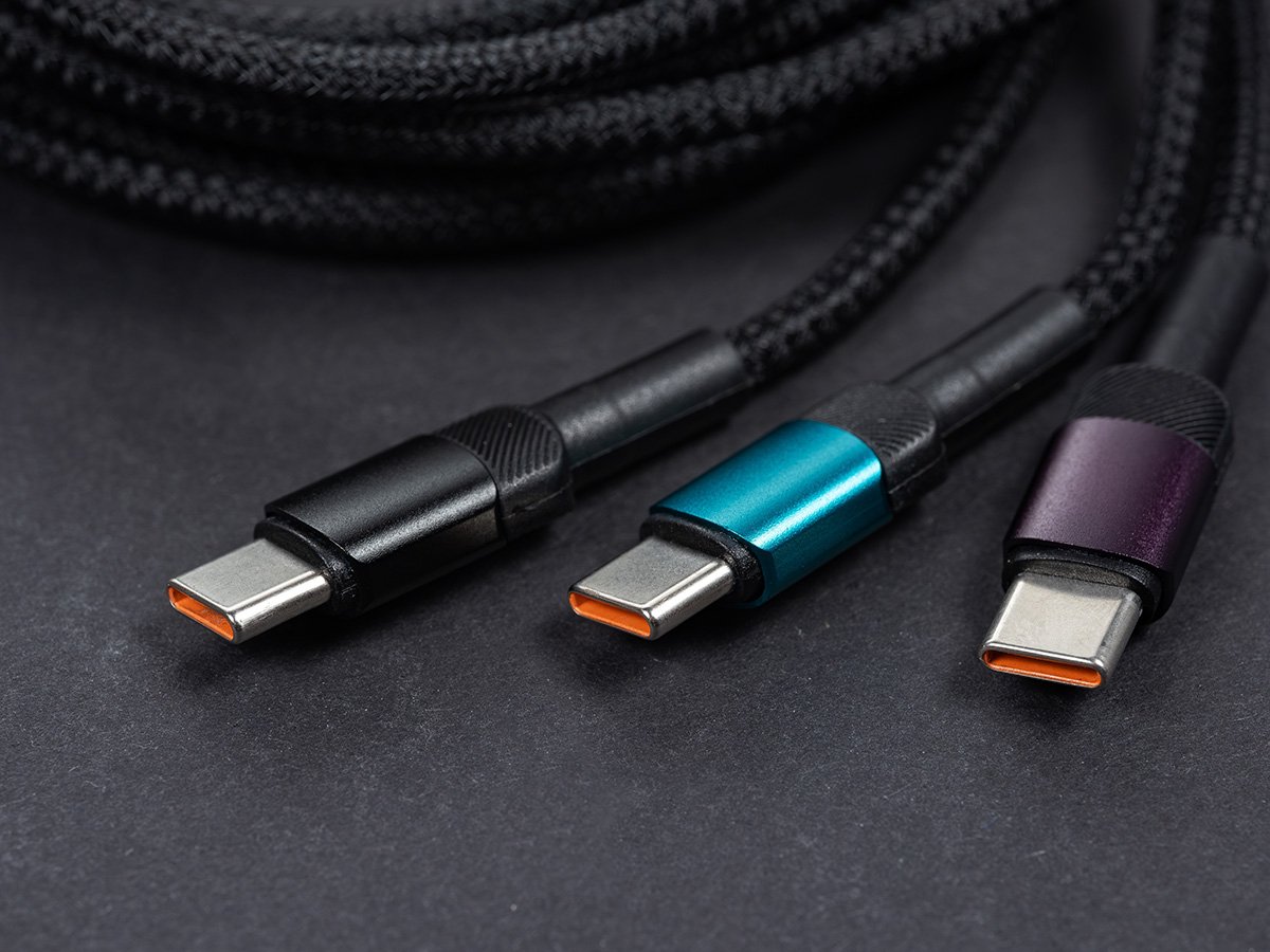 Three braided USB‑C charging cables with different coloured ends.
