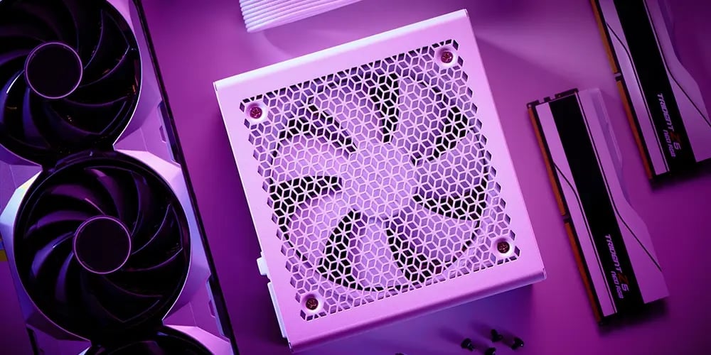 Purple-lit close-up of computer components: a white power supply unit with fan, GPU, RAM sticks, and cables, evoking a sleek, techy vibe.