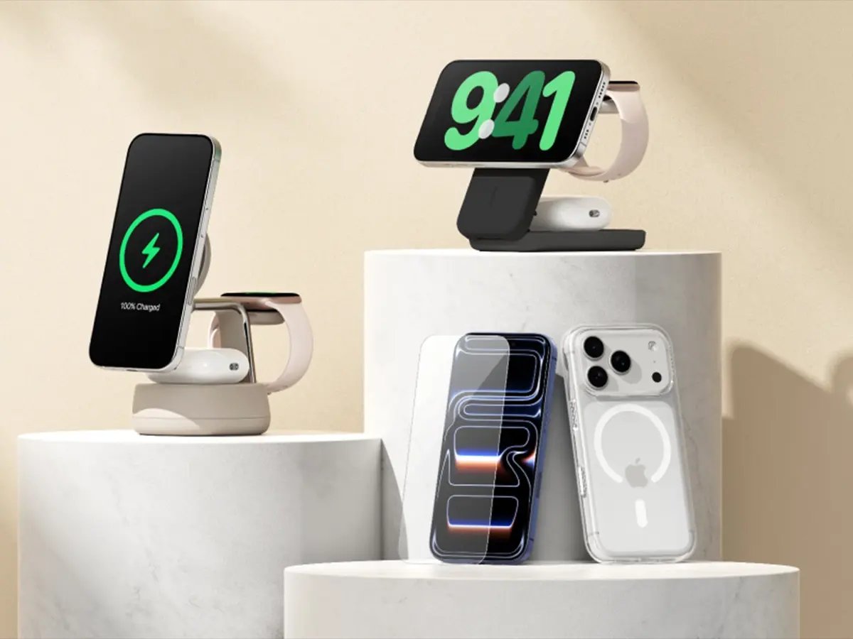 Smartphones displayed on sleek charging stands atop marble platforms.