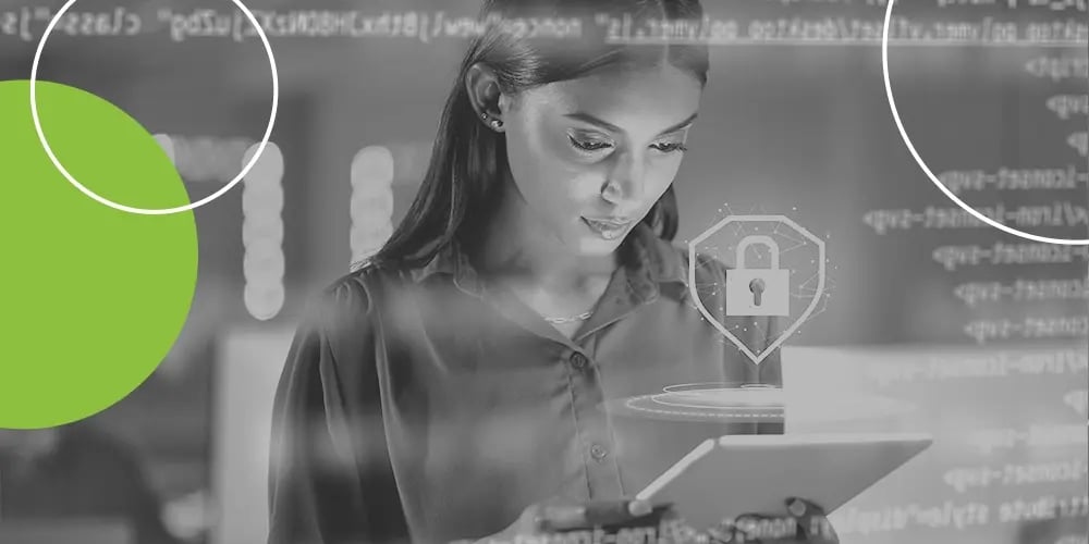 Person using a tablet with digital security icons and code overlays.