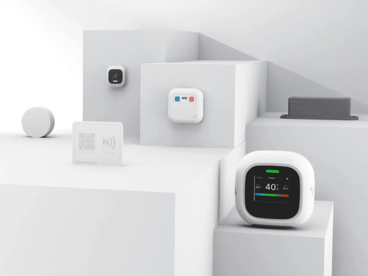 A collection of compact IoT devices arranged on stepped white platforms.