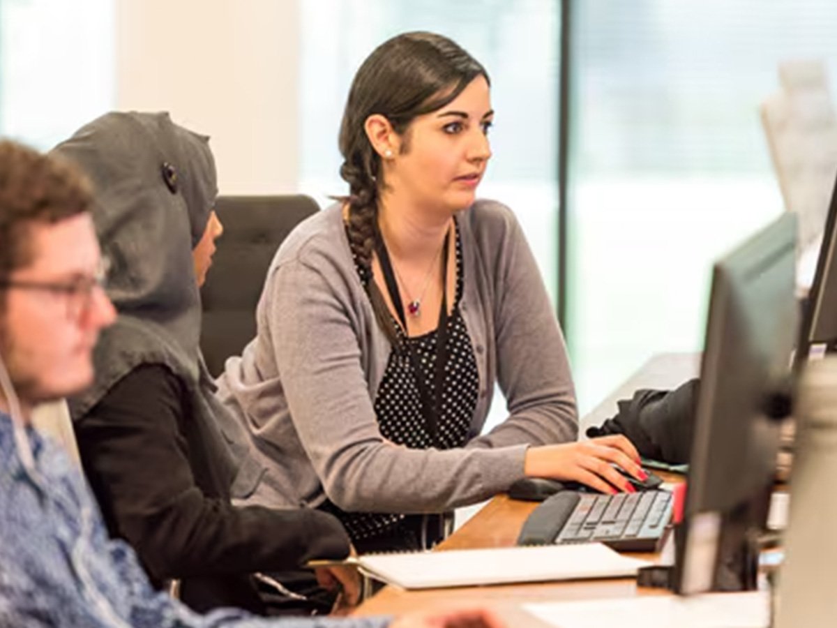 People working at their desks in an office
