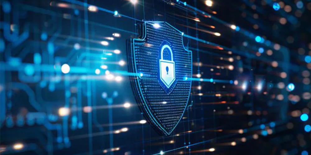 Digital shield with a lock icon over flowing data, representing cybersecurity and data protection.