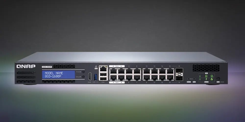 Front view of a QNAP network switch with multiple ports, a digital display showing 