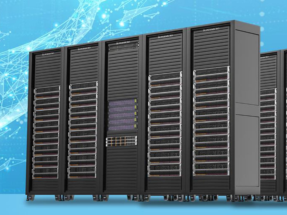 Row of black server racks in a data center, representing high-density computing and storage infrastructure.