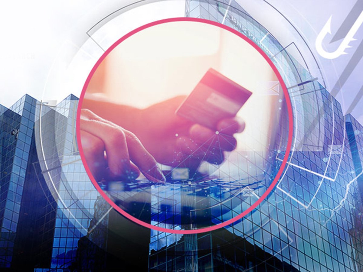 Abstract image of hands typing on a keyboard overlaid with a circular frame and glass building background.