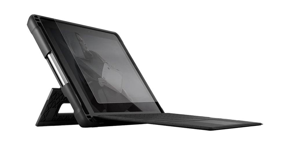 Tablet with keyboard and rugged case in a standing position.