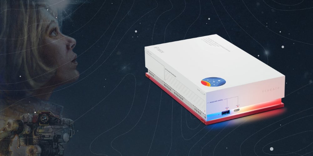 Compact white edge computing device connected via cables, displayed against a futuristic technical background.