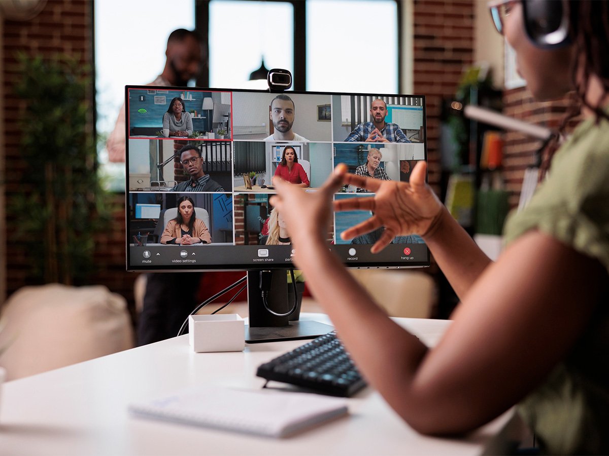 Person sitting at desk on a video conference call