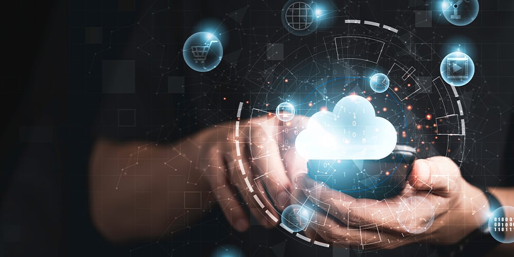 Close up of hands using a mobile phone with cloud and digital graphics overlay