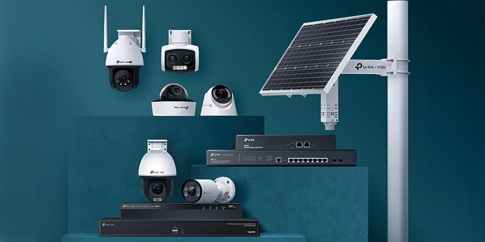 TP‑Link VIGI security cameras and network devices displayed beside a solar panel.
