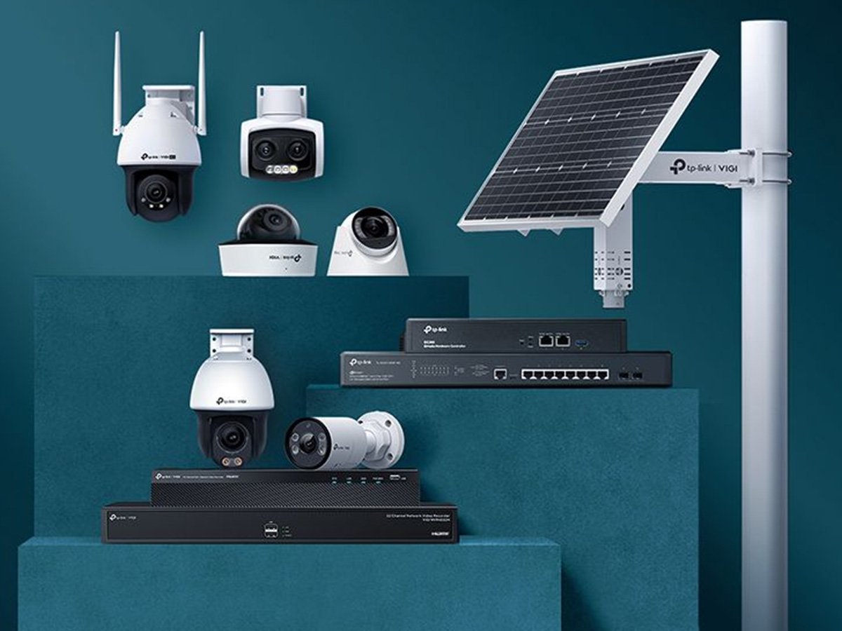 TP‑Link VIGI security cameras and network devices displayed beside a solar panel.