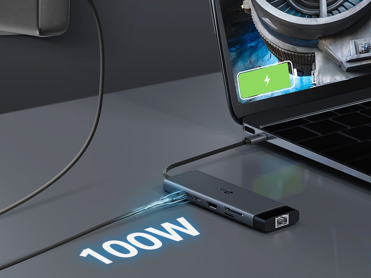 USB‑C docking adapter connected to a laptop, displaying high‑speed wired network connectivity.
