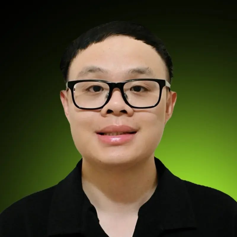 a portrait photo of Wilson Ou on a gradient background