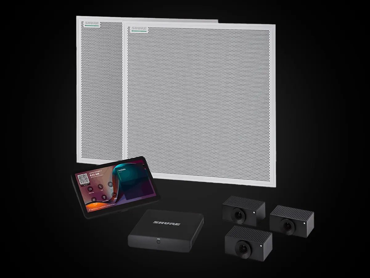 Two Shure ceiling array microphones displayed with a touch controller, processor, and three compact cameras.