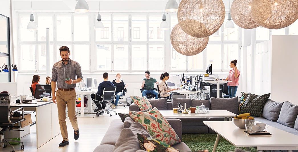 Modern office scene with people working
