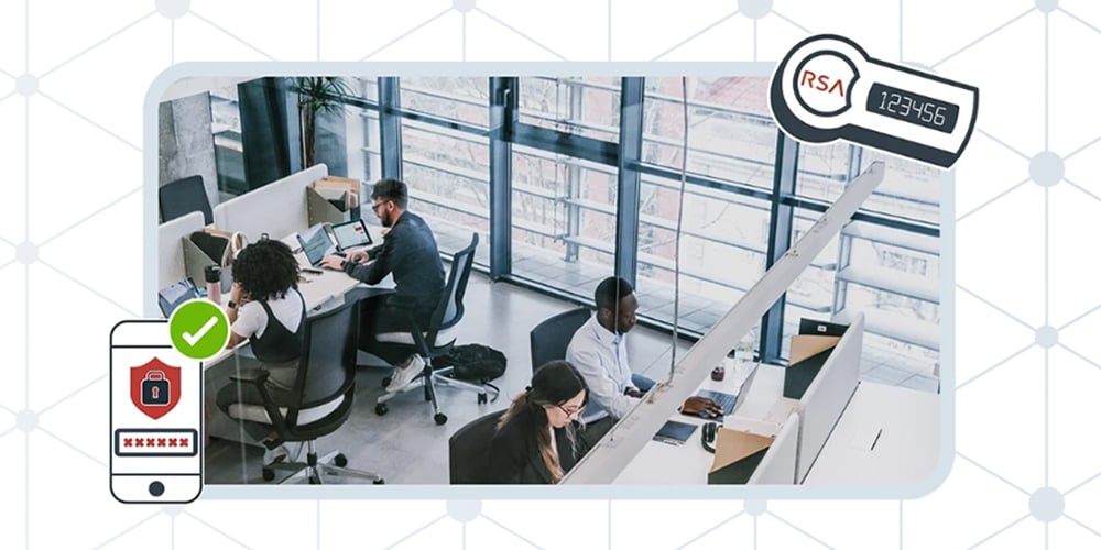 People working at desks in a modern open‑plan office, with security and authentication icons shown around the scene.