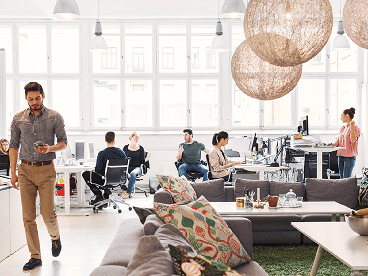 Modern office scene with people working