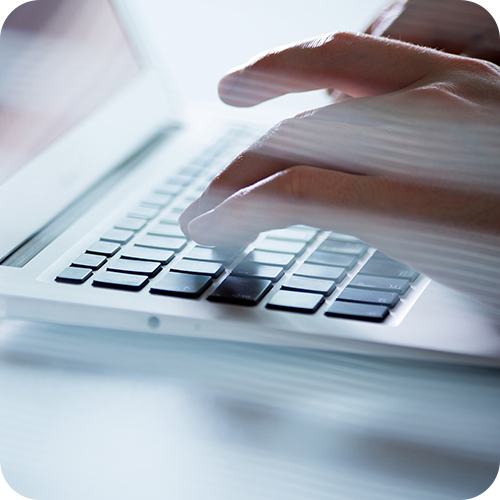 Close up of people working on a laptop Close up of people working on a laptop